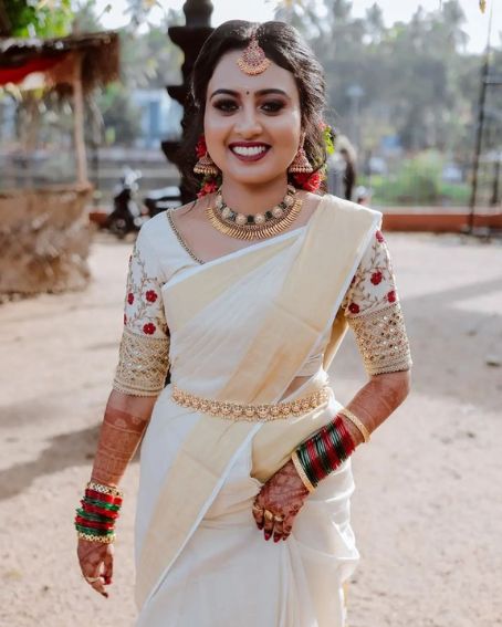  Kerala Wedding Saree With Beautiful Embroidered White Blouse