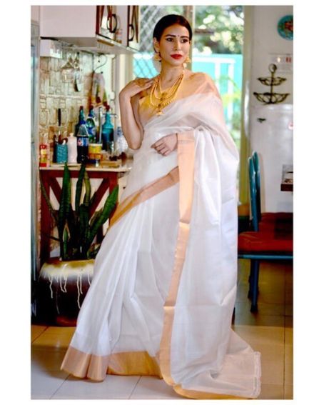 Amazing White And Gold Saree