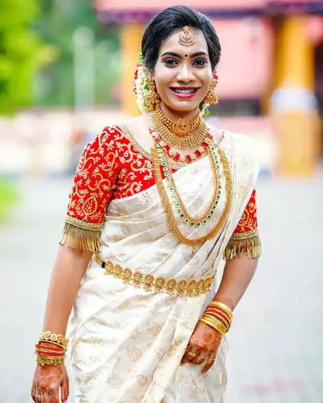 White Kerala Wedding Saree And Blouse  