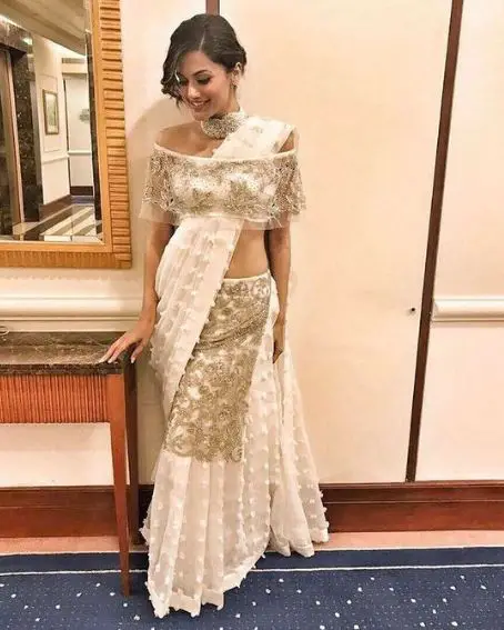 Lovely Taapsee Pannu Wore A White And Gold Saree