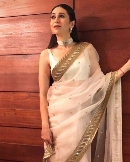 Awesome Look Of Karishma Kapoor In White And Gold Silk Saree