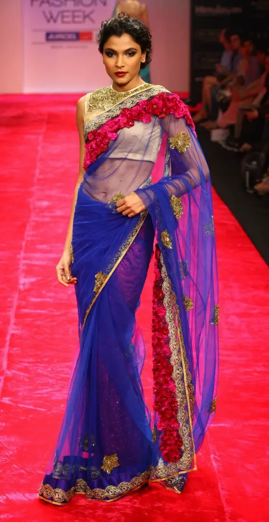 Blue Net Saree Paired With Jewel Blouse