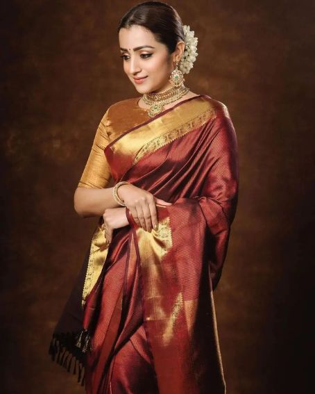 Trisha In Maroon Colour Traditional Saree