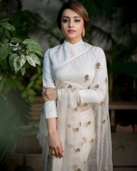 Trisha In White Net Saree