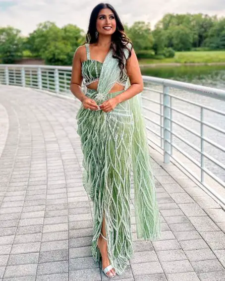 Feathery Fancy And Trendy Saree Gown With Sleeveless Blouse