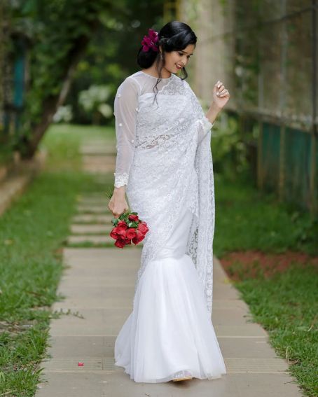 Kerala Christian Bride In White Saree And Blouse Design