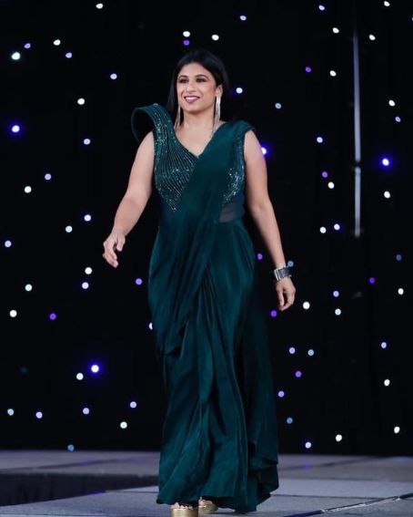 Fascinating Unique Designer Dark Green Saree Gown