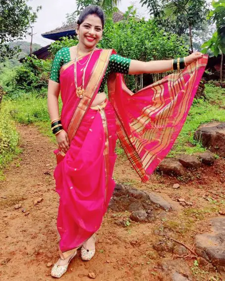Amazing Pink And Green Nauvari Saree With Gold Border