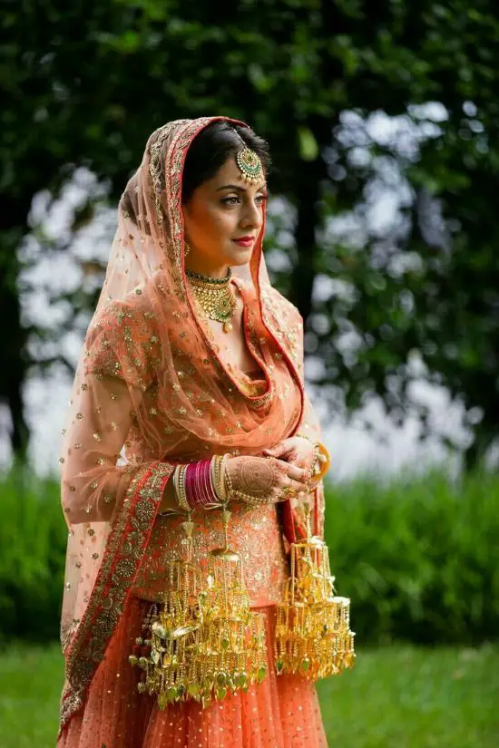 Panjabi Bride Wearing Lehenga With Long Blouse