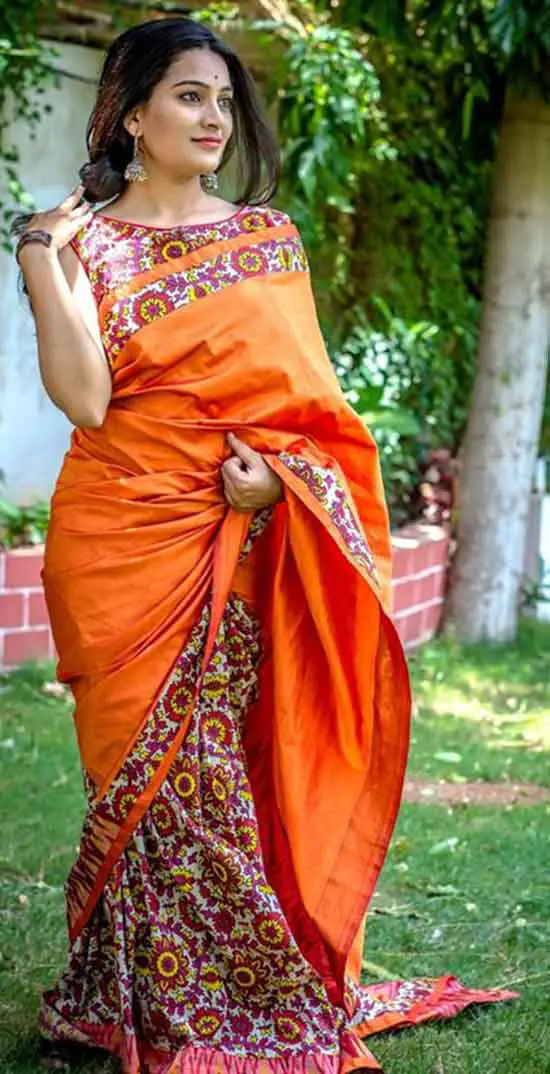Ravishing Chanderi silk saree with ‎kalamkari print half and half pattern