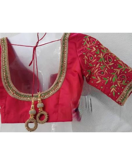 Red Blouse With Green Thread Work Design On Hand
