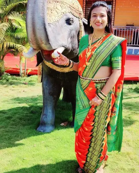 The Lovely Orange And Green Nauvari Saree