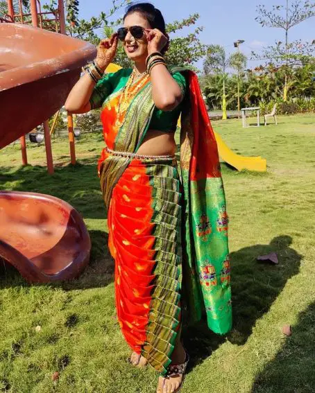 The Royal Look Of Nauvari Saree In Bright Red And Green