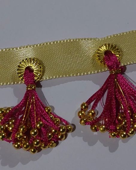 The Small Hanging Of Beads Saree Kuchu Designs