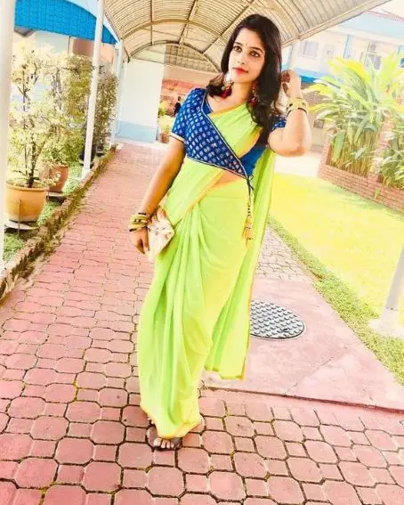 Parrot Green Saree With Knot Style Jacket Blouse Design