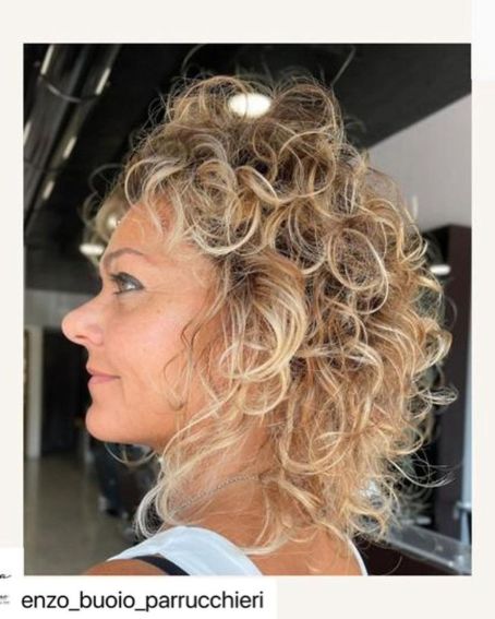 Curly Bob With Blonde Highlight