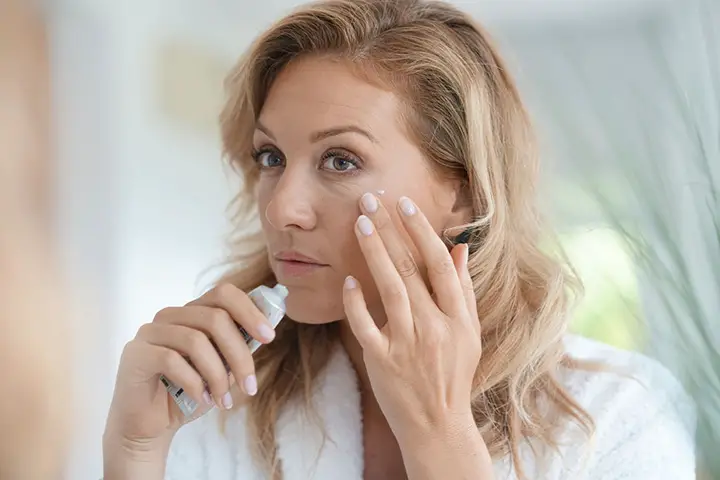 women applying primer over 40