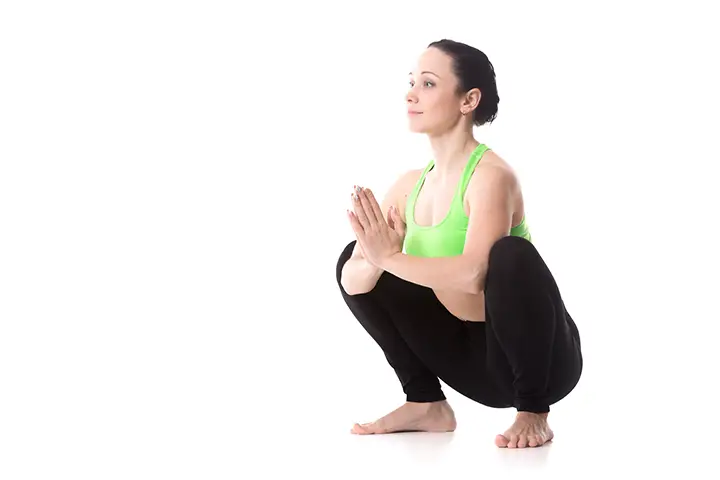 modified garland pose for hips