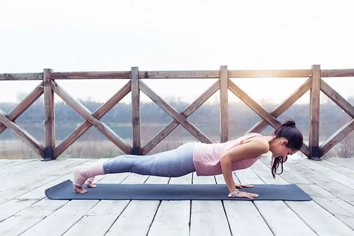 four limbed staff pose for triceps