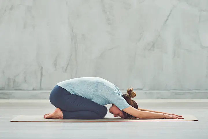 child's pose to improve posture