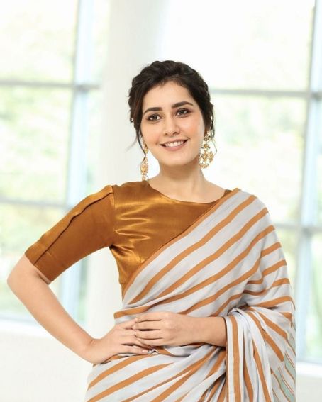 Rashi Khanna In Copper Stripes On White Saree And Copper Blouse