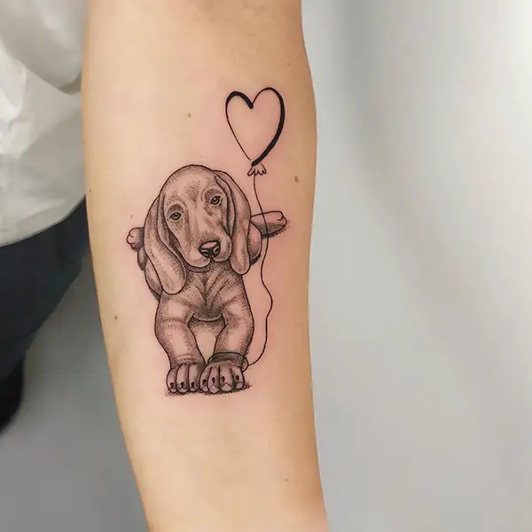 Small Dog Tattoo on Arm