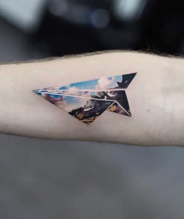 A Paper Plane Tattoo Picturizing Nature