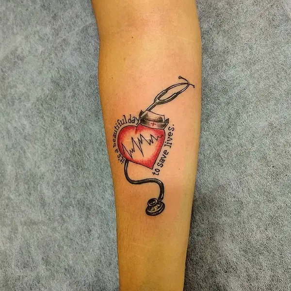 A Red Heart with a Quote and Stethoscope Tattoo