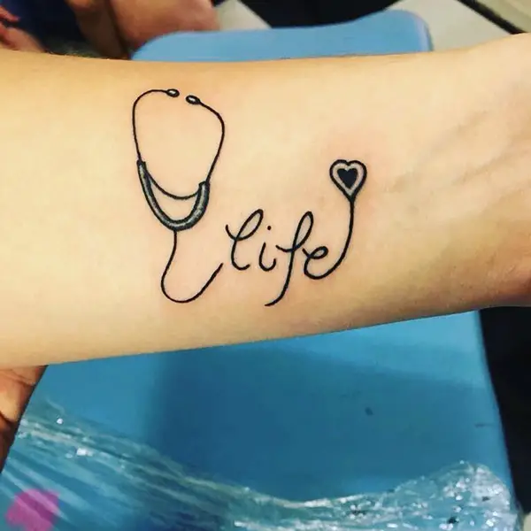Cute Tattoo with Life and a Heart Symbol