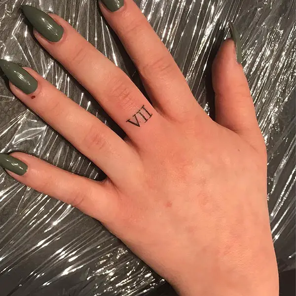 Exciting Numeral Tattoo on Finger