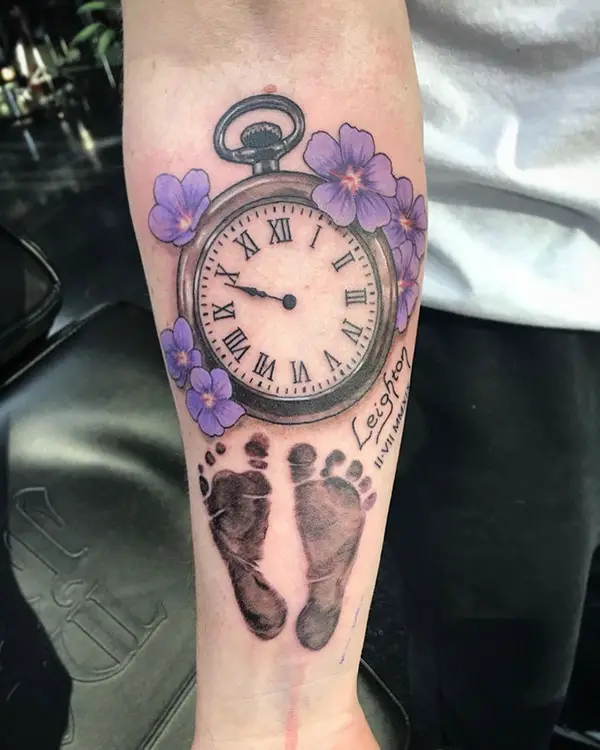 Footprint with a Clock Tattoo