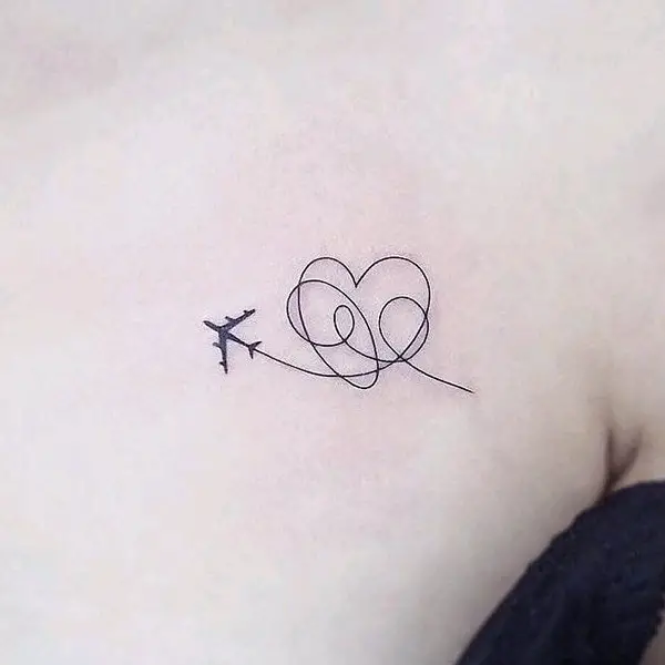 Heart Outline Tattoo with an Airplane
