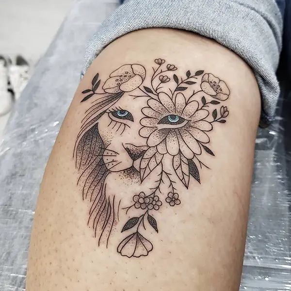 Lion with Flowers Tattoo
