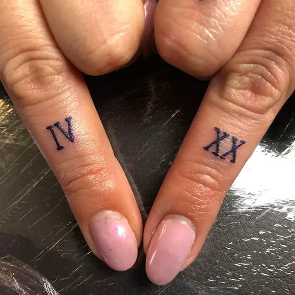 Minimalistic Roman Numeral Tattoo