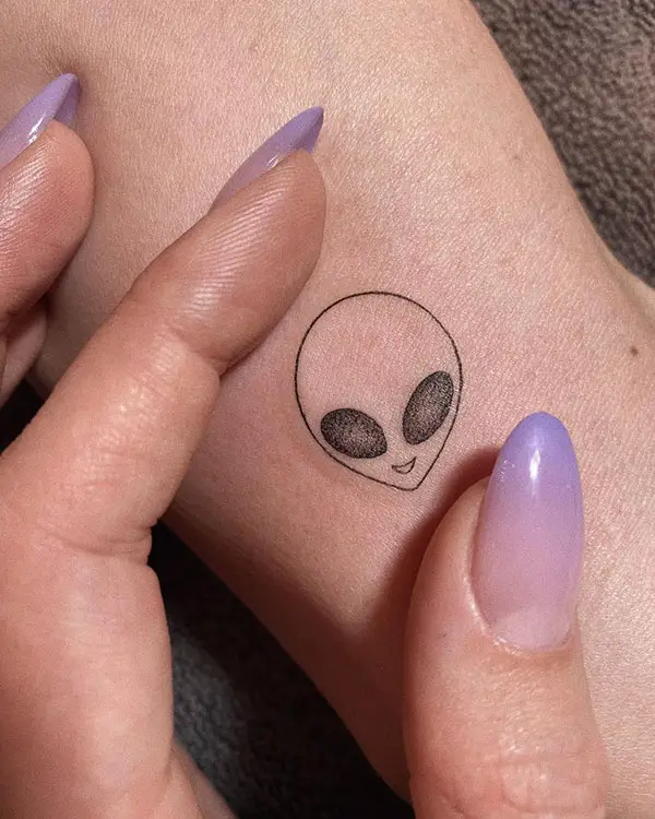 Oval Shaped Alien Tattoo