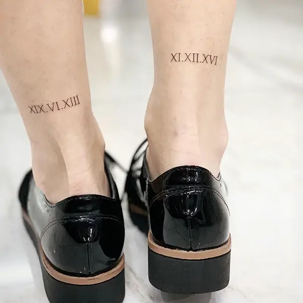 Roman Numeral Tattoo on Both Legs
