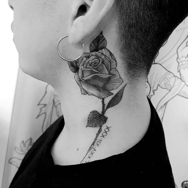 Rose Tattoo with the Roman Numeral Date on the Neck