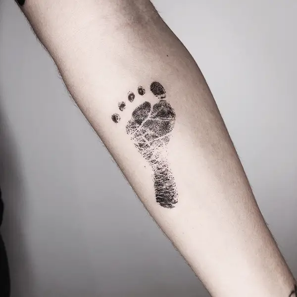 Foot Tattoo on the Forearm