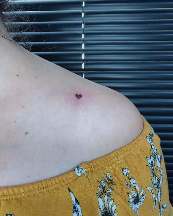 A Tiny Black Heart Tattoo