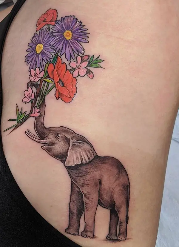 Elephant Holding a Bunch of Flowers