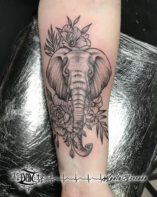 Elephant Tattoo with Flowers and Leaves
