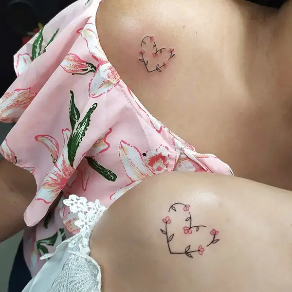 Friendship Heart Tattoo with Small Flowers