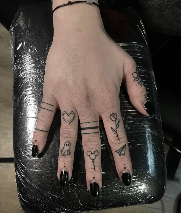 Heart Tattoo with Multiple Elements in other Fingers