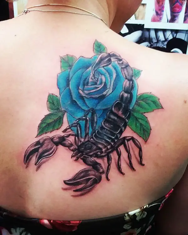 Scorpion with a Blue Rose