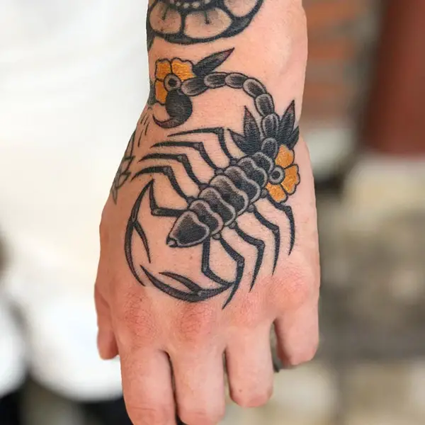 Scorpion with a Yellow Flower