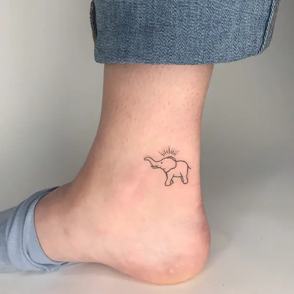Tiny Elephant Outline Tattoo