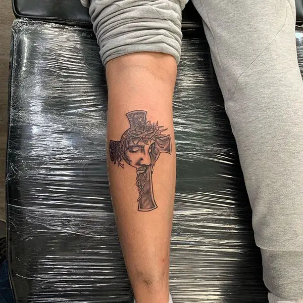 Crucified Jesus on a Holy Cross Tattoo