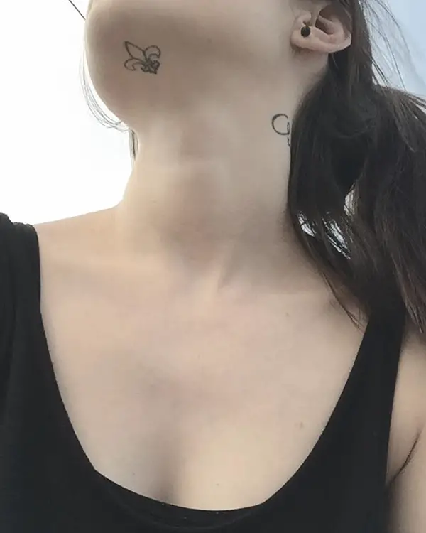 Fleur-De-Lis Tattoo Under the Chin