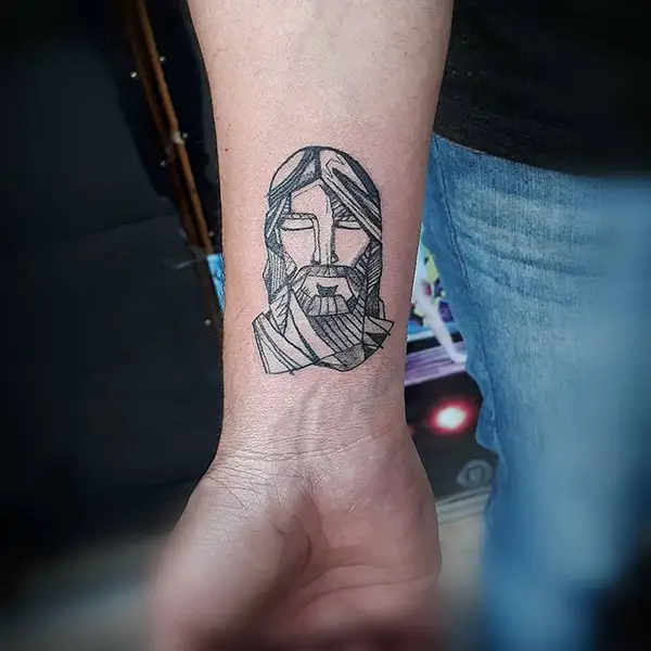 Small Jesus Tattoo Design on Wrist