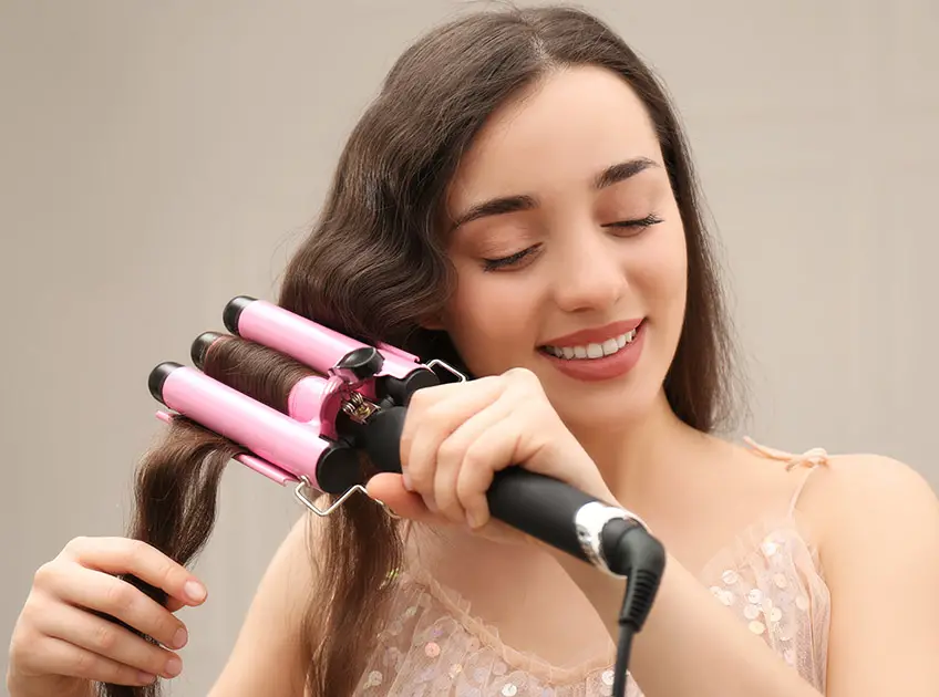 how to use a three barrel curling iron